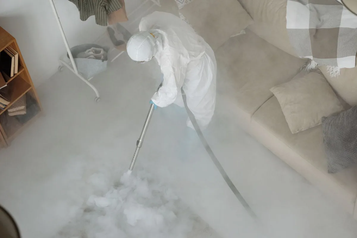 Biohazard cleanup technician in protective equipment, Winter Gardens, CA